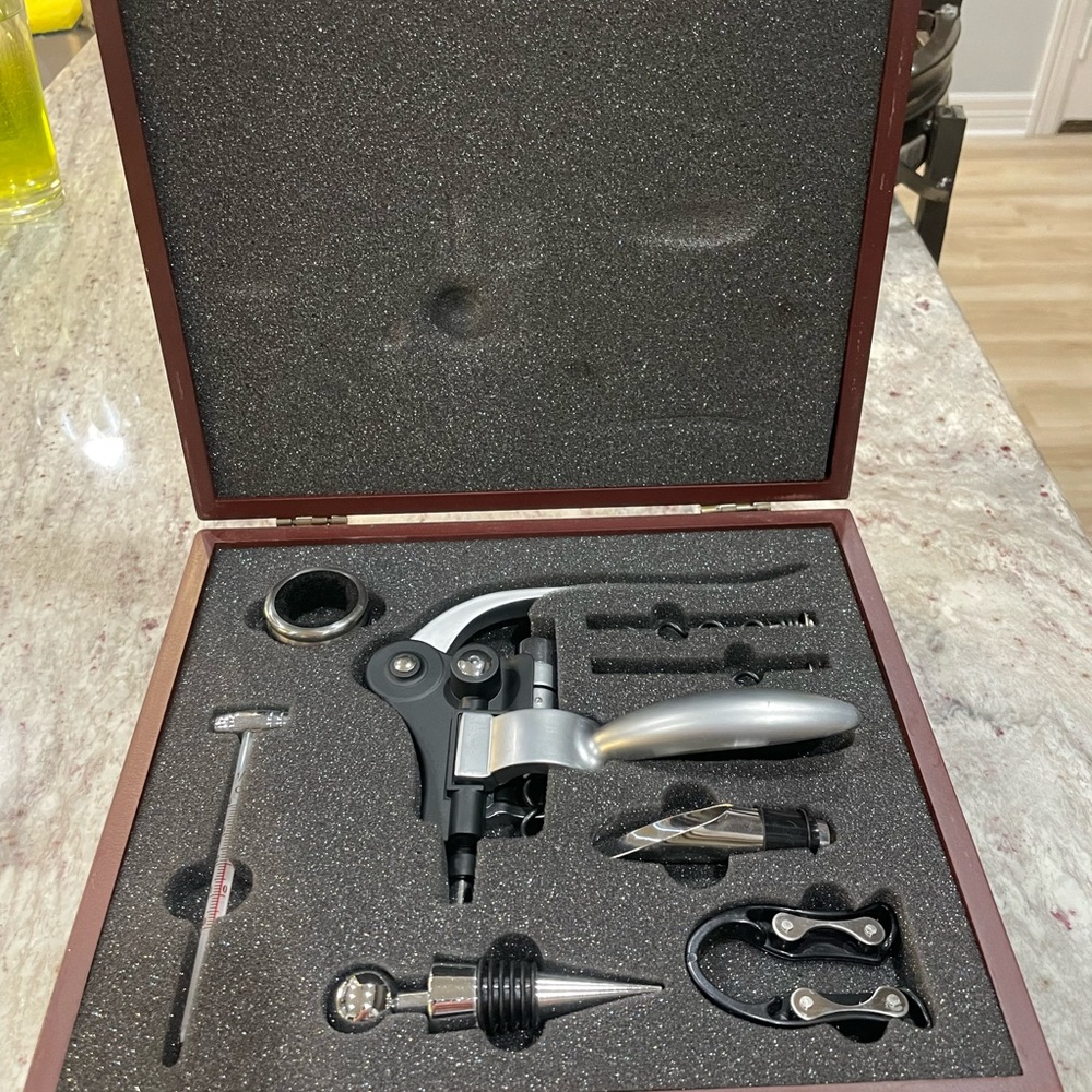 Wine opener set in wooden box